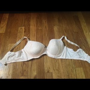 Nursing/pumping bra. Fold down cup to hold pump